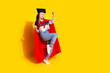 © deagreez - Full length photo of overjoyed funny girl dressed striped shirt raising fist up win first place isolated on yellow color background