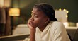 © peopleimages.com - Sad, thinking and black woman in home with depression after breakup, trauma or frustrated by stress. College, student and girl with crisis in mental health, anxiety or remember problem with fatigue