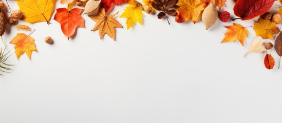 Poster - Copy space image of an autumn themed background with a frame created from dried leaves Perfect for capturing the mood of fall Thanksgiving Day and the beauty of the season It features a flat lay persp