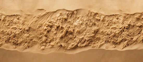 Wall Mural - A close up image of the textured sand on the beach perfect for adding copy space