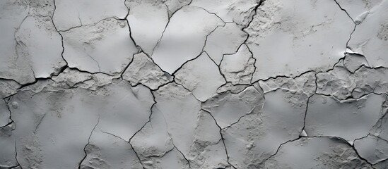 Poster - A cracked cement surface covered in gray serves as a backdrop for design with available copy space image