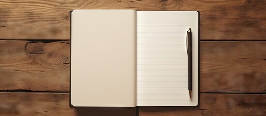 Poster - Gift set with a designer notebook featuring a leather cover It is displayed on a wooden background showcasing both its closed and open states The notebook includes thick paper and numerous pages Copy