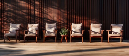 Aufkleber - Brown armchairs arranged on a wooden balcony with ample space for a copy image