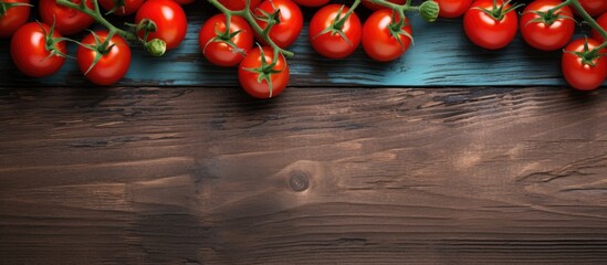Poster - A copy space image featuring fresh cherry tomatoes on a wooden table viewed from above