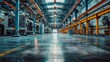 © fourtakig - Frontal view of empty, spotless factory floor with industrial equipment
