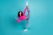 © deagreez - Full length photo of lovely teen lady flexible split v-sign dressed stylish pink garment isolated on cyan color background