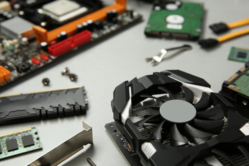 Poster - Graphics card and other computer hardware on gray background, closeup