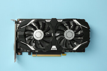Poster - Computer graphics card on light blue background, top view