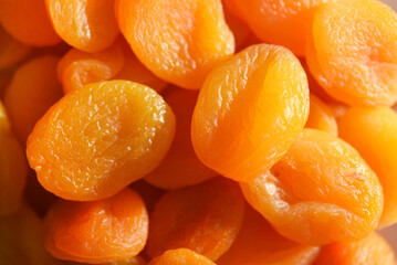 Wall Mural - Dried fruits. Dried apricots. Dried apricots in close-up on a white plate.