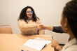 © ADDICTIVE STOCK - Handshake at the Coworking Space with Friends Team