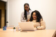 © ADDICTIVE STOCK - Diverse Friends Collaborating at Coworking Space