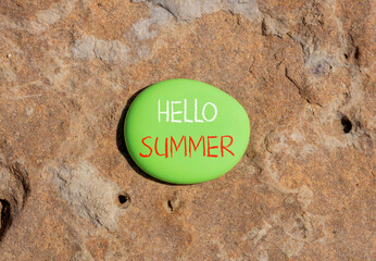 Hello summer symbol. Concept words Hello summer on beautiful green stone. Beautiful red stone background. Business lifestyle Hello summer concept. Copy space.