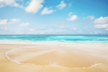 Beautiful blurred defocused beach background. Natural landscape with empty tropical beach.
