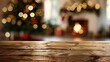 © Neuropixel - A wooden table surface with a blurred Christmas background featuring a fireplace and decorated tree, creating a warm holiday atmosphere.