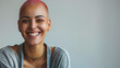 © Sophie  - Professional portrait of a happy mixed race lesbian with pink hair. Gay black woman. Grey copy space for text