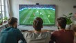 © Space Priest - Three men are watching a soccer game on a large television, football on TV