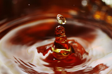 Canvas Print - Macro shot of tea drink ripples as background