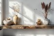 © Aliaksandra - minimalist interior design, minimalist shelf on an empty white wall showcasing carefully selected decor items, embodying the ethos of new age minimalism less is more