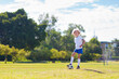© famveldman - Kids play football. Child at soccer field.
