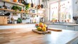 © tantawat - A clean kitchen island with a bowl of fresh fruit, a cutting board, and utensils neatly arranged. The bright and airy space is perfect for preparing meals and enjoying the art of cooking.