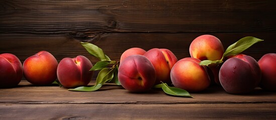 Canvas Print - A copy space image of juicy nectarines arranged on a rustic wooden table