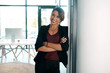 © peopleimages.com - Corporate, woman and arms crossed with portrait in office with happiness for career in law, advocacy and justice for people. Female advisor, confident and proud legal professional, attorney and pride
