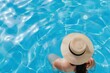 © Afeefa_Rehman - young beautiful woman in straw hat relaxing in spa pool