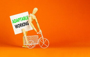 Adaptable working symbol. Concept words Adaptable working on beautiful white paper on wooden clothespin. Beautiful orange background. Bike model. Business Adaptable working concept. Copy space.