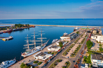 Wall Mural - Aerial landscape of the harbor in Gdynia with modern architecture in setting sun. Poland