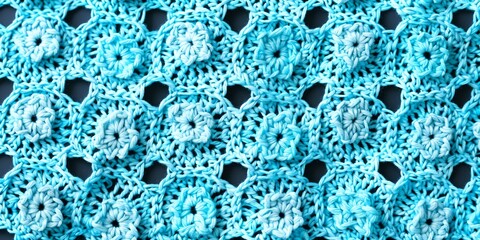 Wall Mural - a blue crocheted blanket with holes