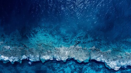 Wall Mural - Top down view of a deep blue ocean shoreline,aerial photography, generated with AI