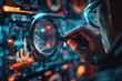 ©  Green Creator - Close up of a hand holding a magnifying glass over a computer screen with data and graphs.