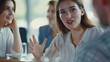 © AI Lab - Making great decisions Young beautiful woman gesturing and discussing something with smile while her coworkers listening to her sitting at the office table : Generative AI
