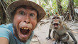 © john - monkey with silly face selfie with a tourist man