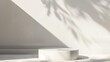 © Nisit - Minimal product display with a white podium and soft shadows