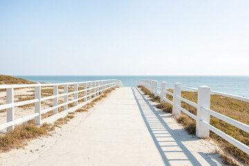 Poster - White Fence Leading to Ocean