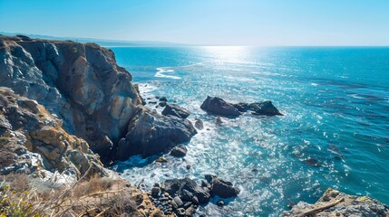 Wall Mural - Coastal cliffs blue water pic