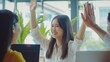 © AI Lab - Young asian business woman giving high five with friends while working with computer laptop at office : Generative AI