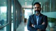 © AI Lab - Confident happy successful ceo financial manager Bearded indian businessman looking at camera standing in modern office with arms crossed Handsome classy corporation owner Business por : Generative AI