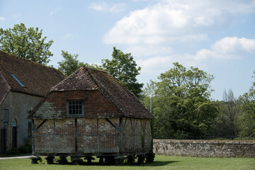 Wall Mural -  a tudor barn in the grounds on Cowdray Estate Midhurst  West Sussex England	