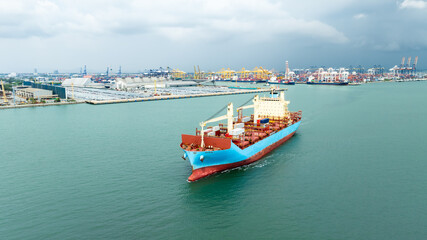 Wall Mural - container ship sailing in sea, shipping business and industry service of cargo logistic import and export international freight transportation by container ship in open sea, aerial view