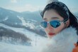 © Paniti - An editorial image of a Korean woman skiing with poise and elegance, set against a stunning winter landscape, highlighting her gorgeous form