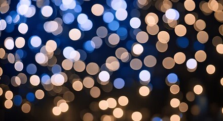 Poster - Defocused warm yellow bokeh lights against a dark background, creating a festive and cozy atmosphere