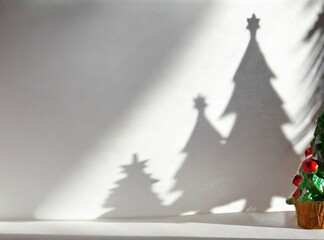 Christmas tree shadow on white background