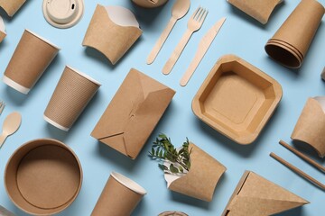 Canvas Print - Flat lay composition with eco friendly food packagings and twigs on light blue background