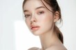 © QuietWord - close up face portrait of young pretty Caucasian woman with bright flawless skin, beauty cosmetic or skincare fashion portrait with copy space isolated on white background,