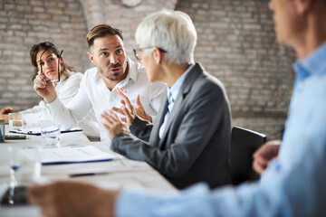 businessman arguing with his colleague on a meeting in the office.