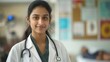 © gn8 - Indian Female Doctor in Clinic with Focused Expressions for Healthcare, Medical Professional, and Diversity Themes