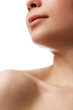 © master1305 - Cropped close-up image of female face and bare shoulders isolated on white background. Smooth moisturized skin. Concept of natural beauty, skincare, wellness, cosmetology, cosmetics