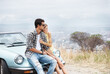 © A.B.�/peopleimages.com - Couple, happy hug and road trip journey by car in summer vacation for freedom, love and adventure together. Care, man and woman travel for holiday, people and outdoor by vehicle for romance on break